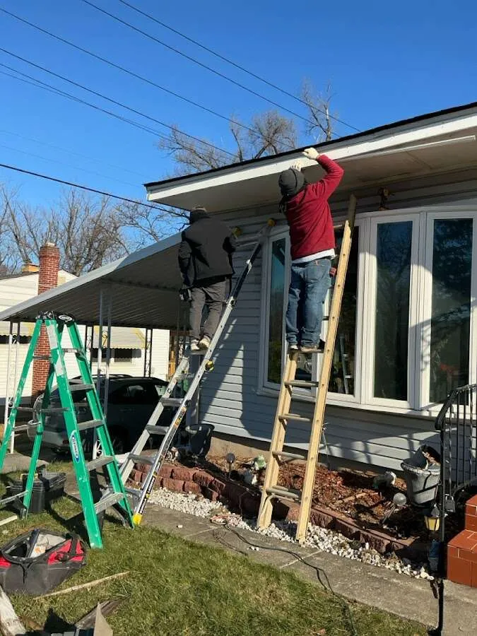 Restoration crew performing exterior repair in Homeland